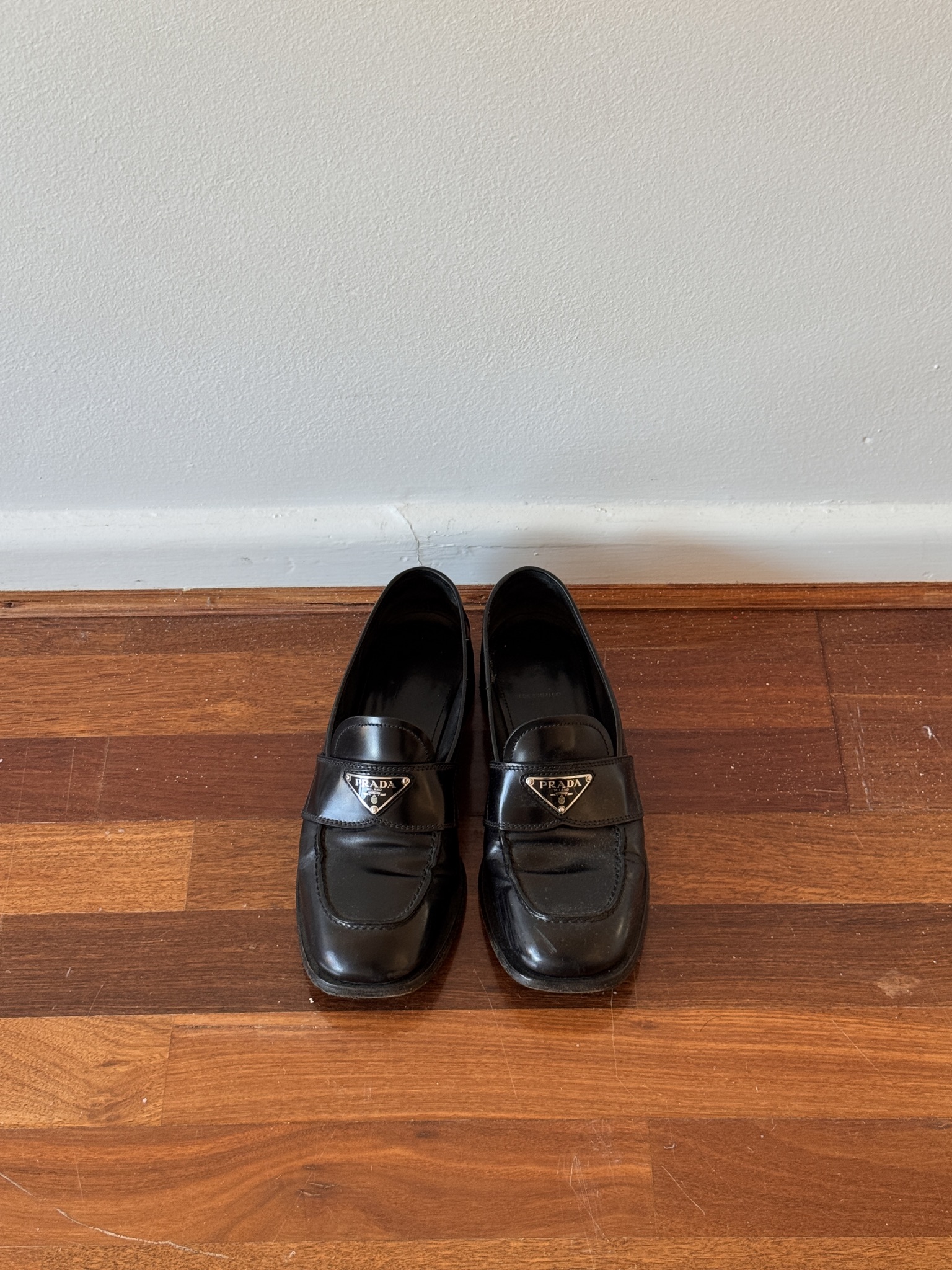 Prada Black Logo Plaque Leather Loafers